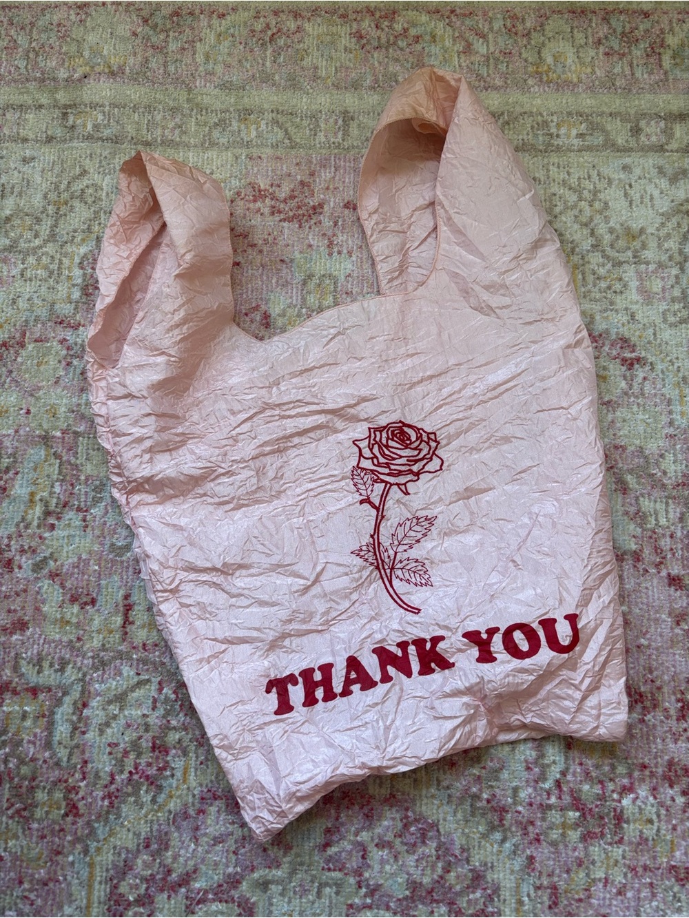 crinkled “thank you” bag